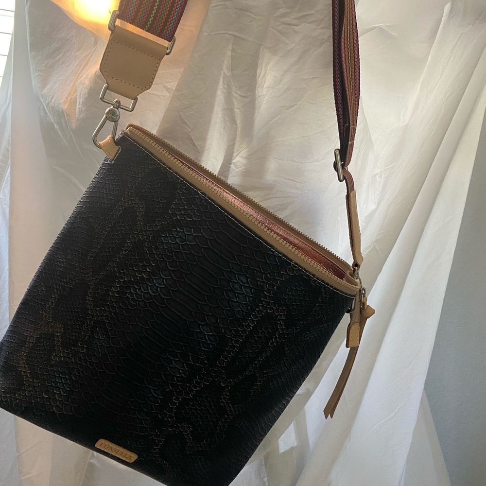 Consuela hobo faux snake skin.